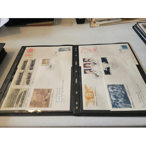Album pages with collectible stamped envelopes.