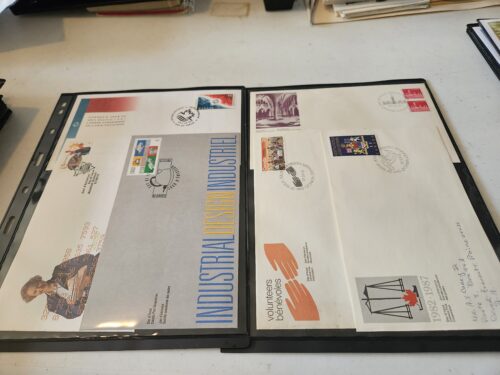 Collection of vintage industrial design envelopes and stamps.