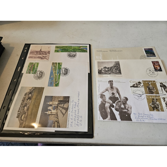 Album pages with Canadian stamps and postcards