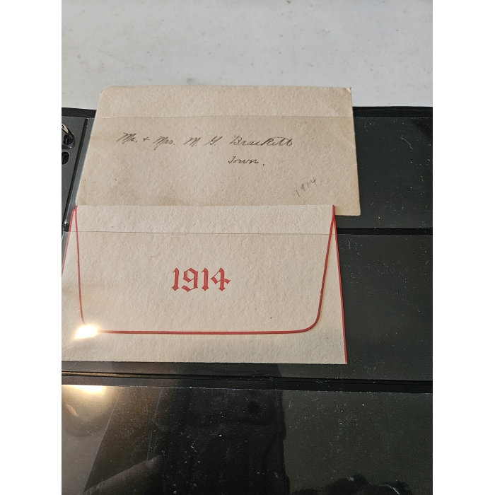 1914 envelope with handwritten card.