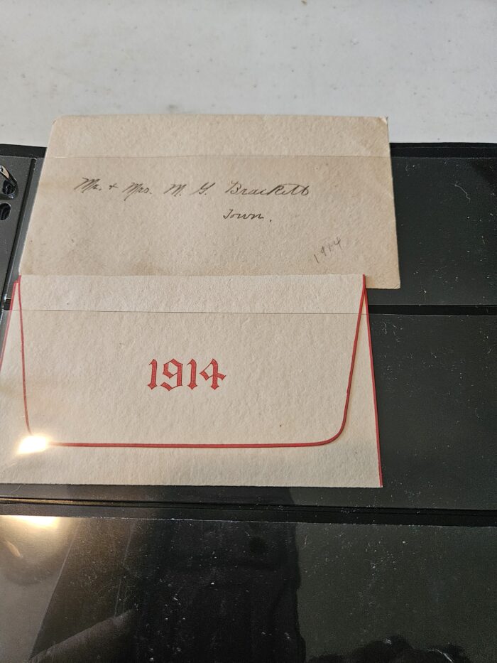 1914 envelope with handwritten card.