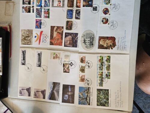 Collection of commemorative stamped envelopes.