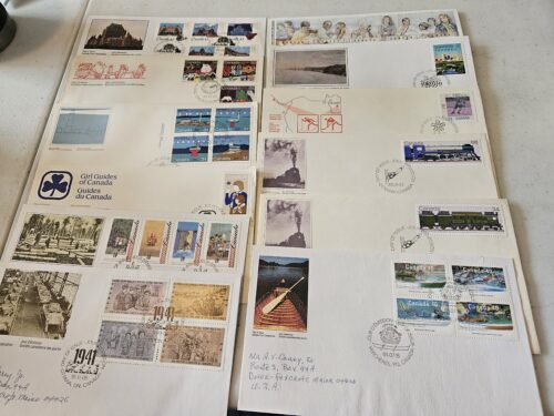 Collection of Canadian stamps on envelopes.