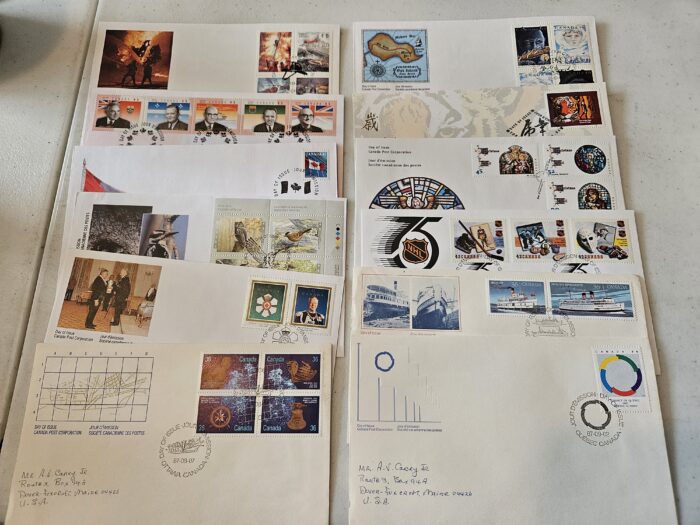 Collection of international postage stamps on envelopes.