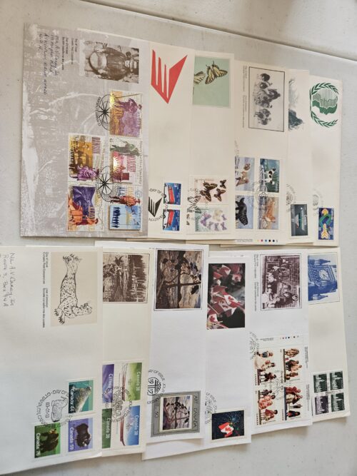 Various stamped envelopes with colorful designs