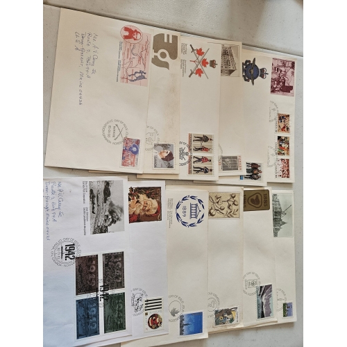 Assorted vintage postal envelopes with stamps and postmarks.