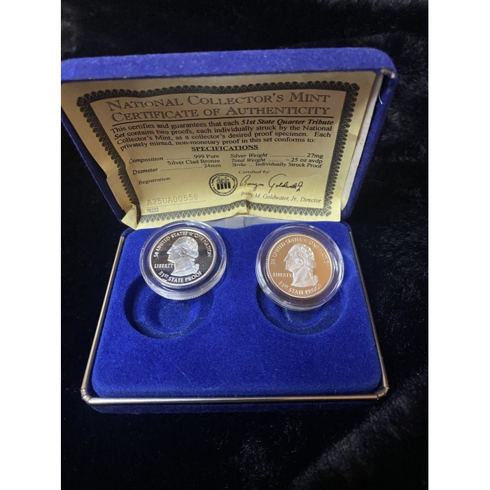 51st State Quarter coins in blue case