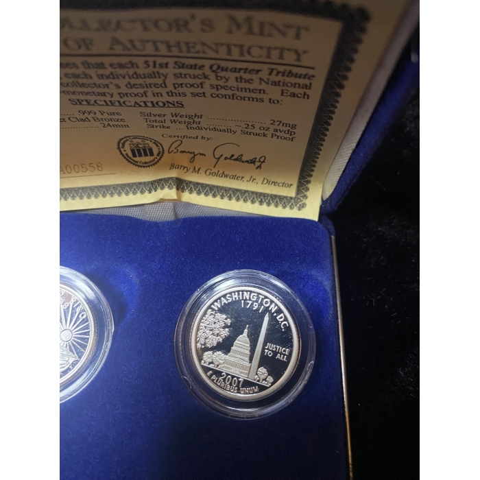 Washington D.C. commemorative quarter in display case
