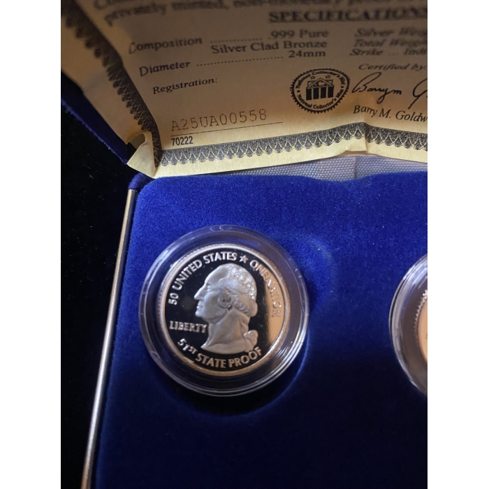 Commemorative coin with certificate and blue display case.