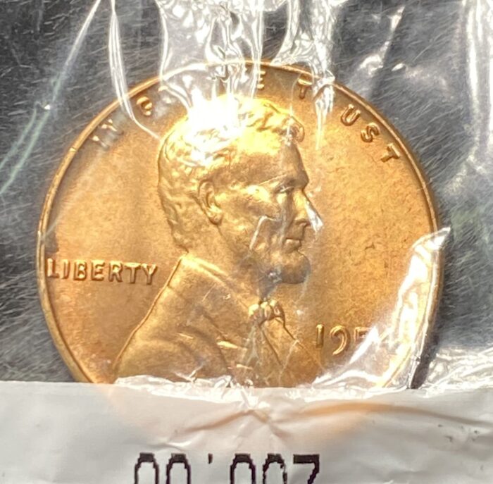 Close-up of a 1971 Lincoln penny in wrapper.