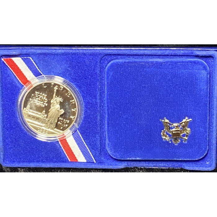 Commemorative coin in blue case with emblem.