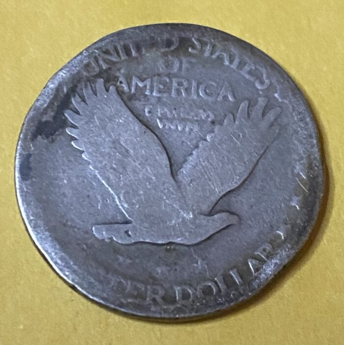 US silver coin with eagle design.