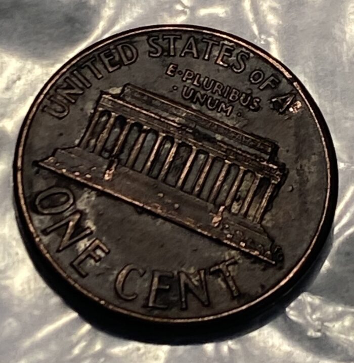 Close-up of a penny showing Lincoln Memorial.